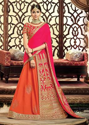 Orange colored embroidered designer taffeta silk  raw silk lahenga choli 1