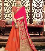 Orange colored embroidered designer taffeta silk  raw silk lahenga choli