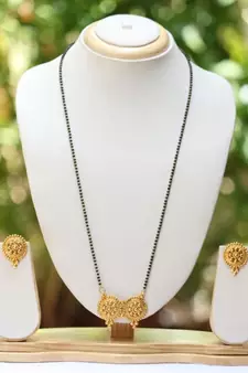 Ethnic earrings and mangalsutra