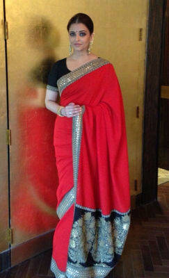 Beautiful aishwarya rai designer red georgette saree with dupion blouse and multi work on it 1