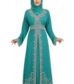 Turquoise georgette islamic kaftan with zari and stone work