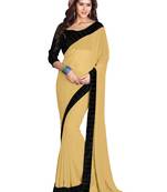 Beige plain faux georgette saree with blouse