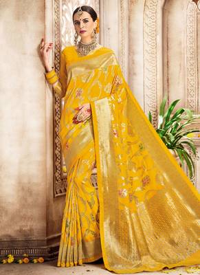 Yellow woven banarasi saree with blouse 1