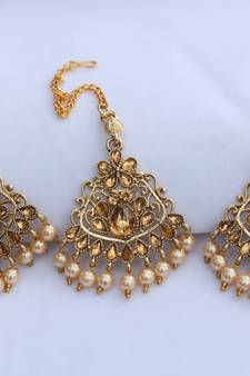  Intricately carved gold stone studded  rose gold pearls maang tikka with earrings for women