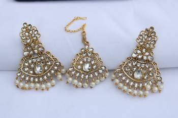  White stone studded and white pearl embellished earrings with maang tikka set for women 1