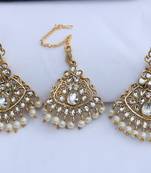  White stone studded and white pearl embellished earrings with maang tikka set for women
