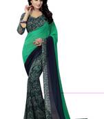 green printed georgette saree with blouse
