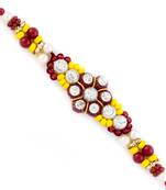 Yellow  And  Red Stones Beads Studded Floral Shape Rakhi