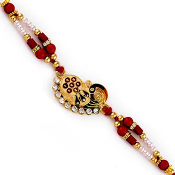 Beautifully Jewelled Peacock Motif Rakhi 1