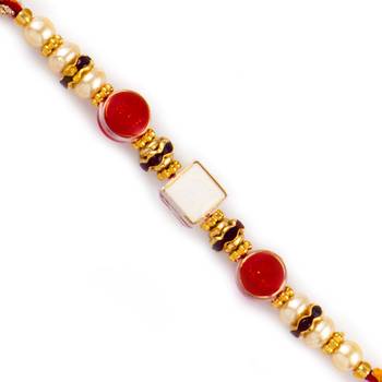 Sqaure Motif With Dual Red Beads Rakhi 1