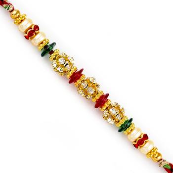 Round Ad Studded Golden Base Rakhi 1