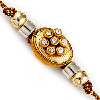 Floral Shape Ad Studded Golden Base Rakhi 1