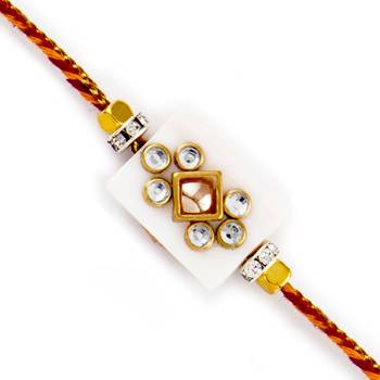 Ad Studded White Base Rakhi 1