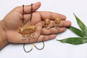 Gold tone mangalsutra with dangling pearls 1