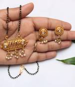 Gold tone mangalsutra with dangling pearls
