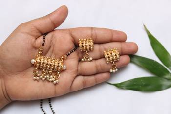 Elegant dangling pearls gold tone mangalsutra 1
