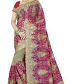 Pink embroidered net saree with blouse