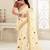 Cream Woven Raw Silk Saree With Blouse