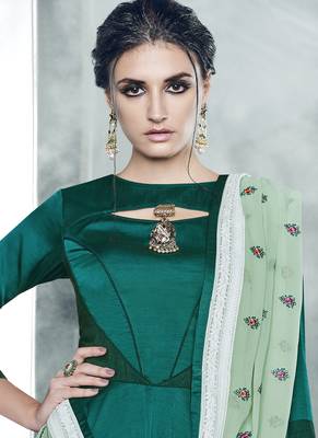 Dark green embroidered satin stitched salwar with dupatta 2