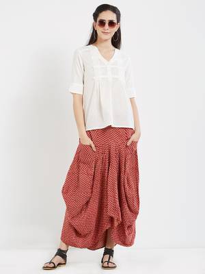 Off white  dobby pleated top with a sleeve with cuffs 1