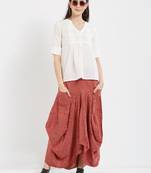 Off white  dobby pleated top with a sleeve with cuffs