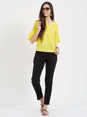 Yellow jaquard  top with a flaired sleeve with gathers 1