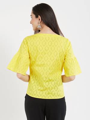 Yellow jaquard  top with a flaired sleeve with gathers 3