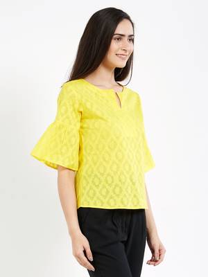 Yellow jaquard  top with a flaired sleeve with gathers 4