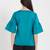 Teal green top with flaired sleeves with gathers