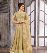Cream embroidered net semi stitched salwar with dupatta