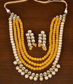 Yellow Colored Pearls, Stone and Kundan Embellished Splendid Designer Multi-layered Necklace Set for Women
