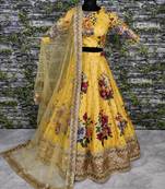 Desiring Yellow Colored Designer Embroidered And Floral Print Art Silk Wedding Lehenga Choli Dupatta Set
