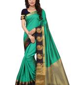 Green woven tussar silk saree with blouse