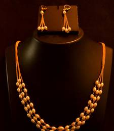 Designer pearl stone golden chain necklace set with matching earrings