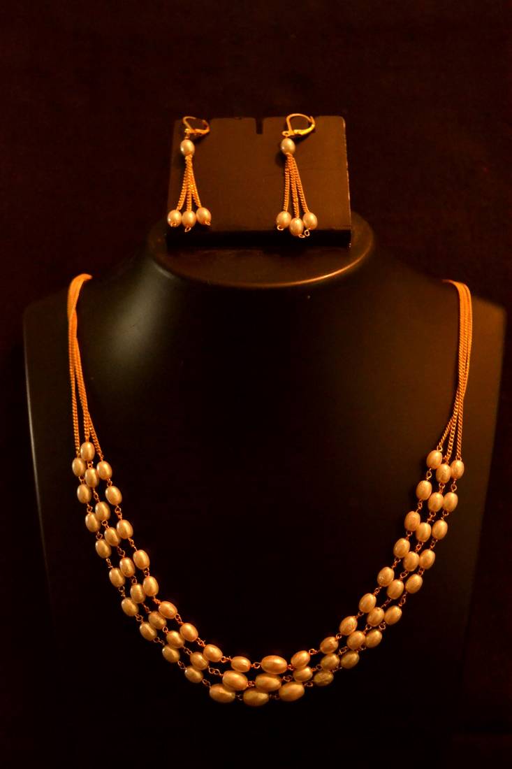 Designer pearl stone golden chain necklace set with matching earrings