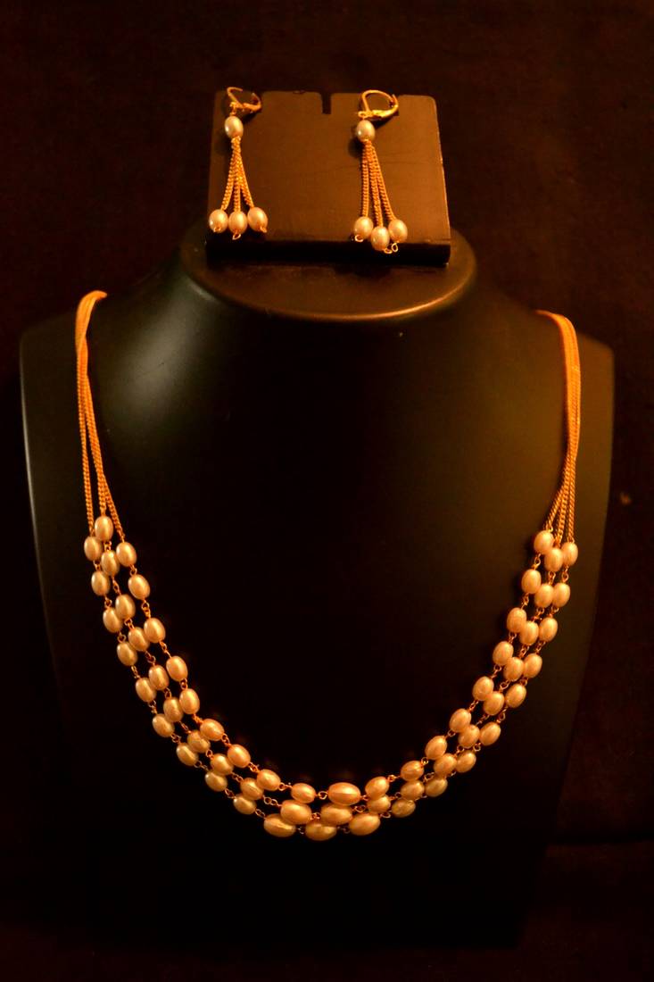 Designer pearl stone golden chain necklace set with matching earrings