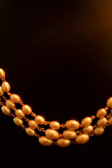 Designer pearl stone golden chain necklace set with matching earrings