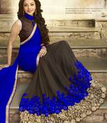 Blue embroidered pure georgette saree with blouse