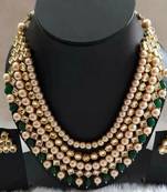 Gold Plated Kundan And Shell Pearls Necklace Set With Green Onyx