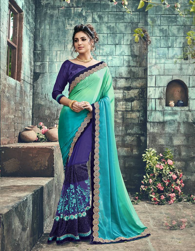 Turquoise Embroidered Georgette Saree With Blouse