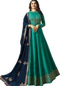 Green embroidered art silk salwar with dupatta