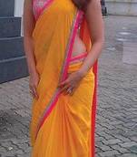 yellow color plain georgette fabric bollywood style saree with blouse piece