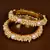 Gold Plated White Stone and Seed Pearls Pair of Designer Bangles for Women