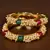 Gold Plated Red, Green Stone and Seed Pearls Pair of Designer Bangles for Women
