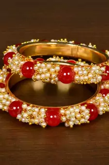 Gold Plated Red Stone and Seed Pearls Pair of Designer Bangles for Women
