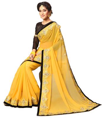 Yellow embroidered georgette saree with blouse 4