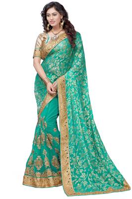Turquoise embroidered brasso saree with blouse 1