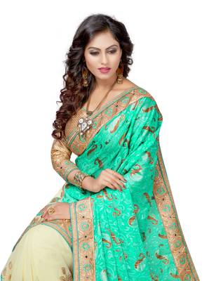 Turquoise embroidered brasso saree with blouse 5