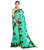Turquoise chiffon saree with blouse