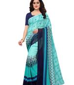 Turquoise printed georgette saree with blouse